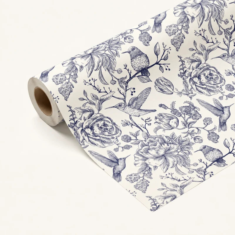 Hummingbird and botanical gift wrap in navy and ivory